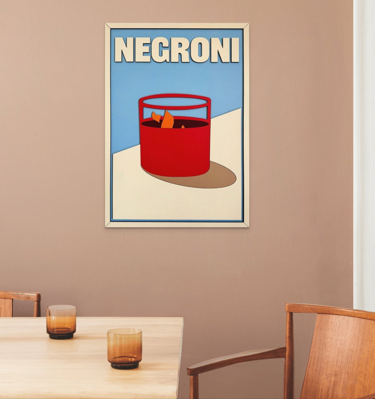 Negroni cocktail wall art in modern minimalist style with bold red drink glass, orange garnish, and blue background – laser cut wooden bar decor sign