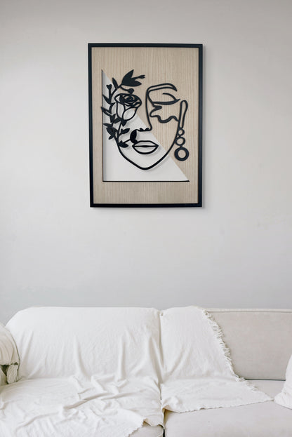 Floral Whisper wall art in one-line art style featuring a woman’s face half-covered by delicate flowers, drawn in minimalist black lines with natural wood tones. Perfect for floral, modern, and minimalist decor.