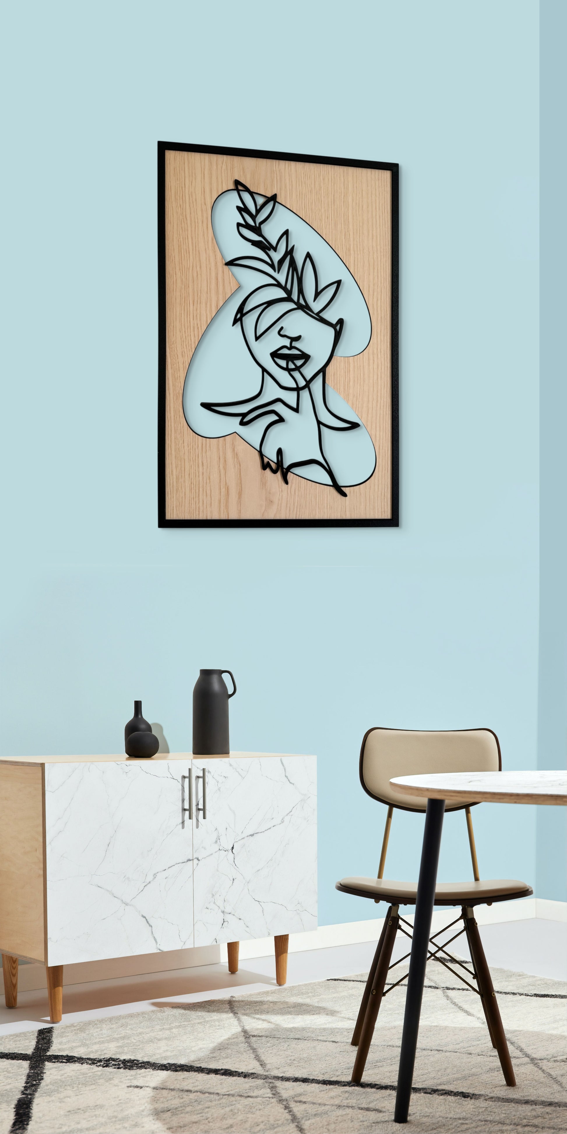 Hidden Voice wall art in one-line art style featuring a woman's face with a finger on her lips, drawn in minimalist black lines with natural wood tones. Ideal for modern and expressive decor.