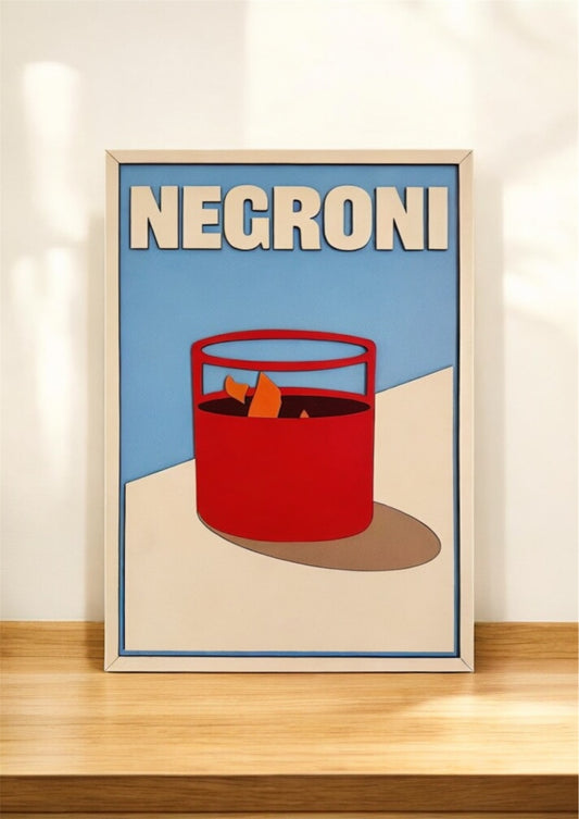 Negroni cocktail wall art in modern minimalist style with bold red drink glass, orange garnish, and blue background – laser cut wooden bar decor sign