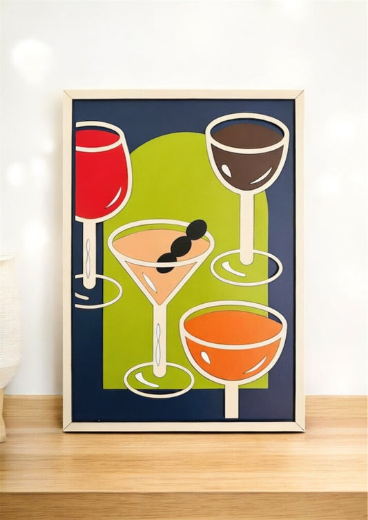 Raise Your Glass wall art featuring a variety of drinks in blue, brown, red, pink, orange, green, and off-white. Perfect for bar, kitchen, or dining room decor.