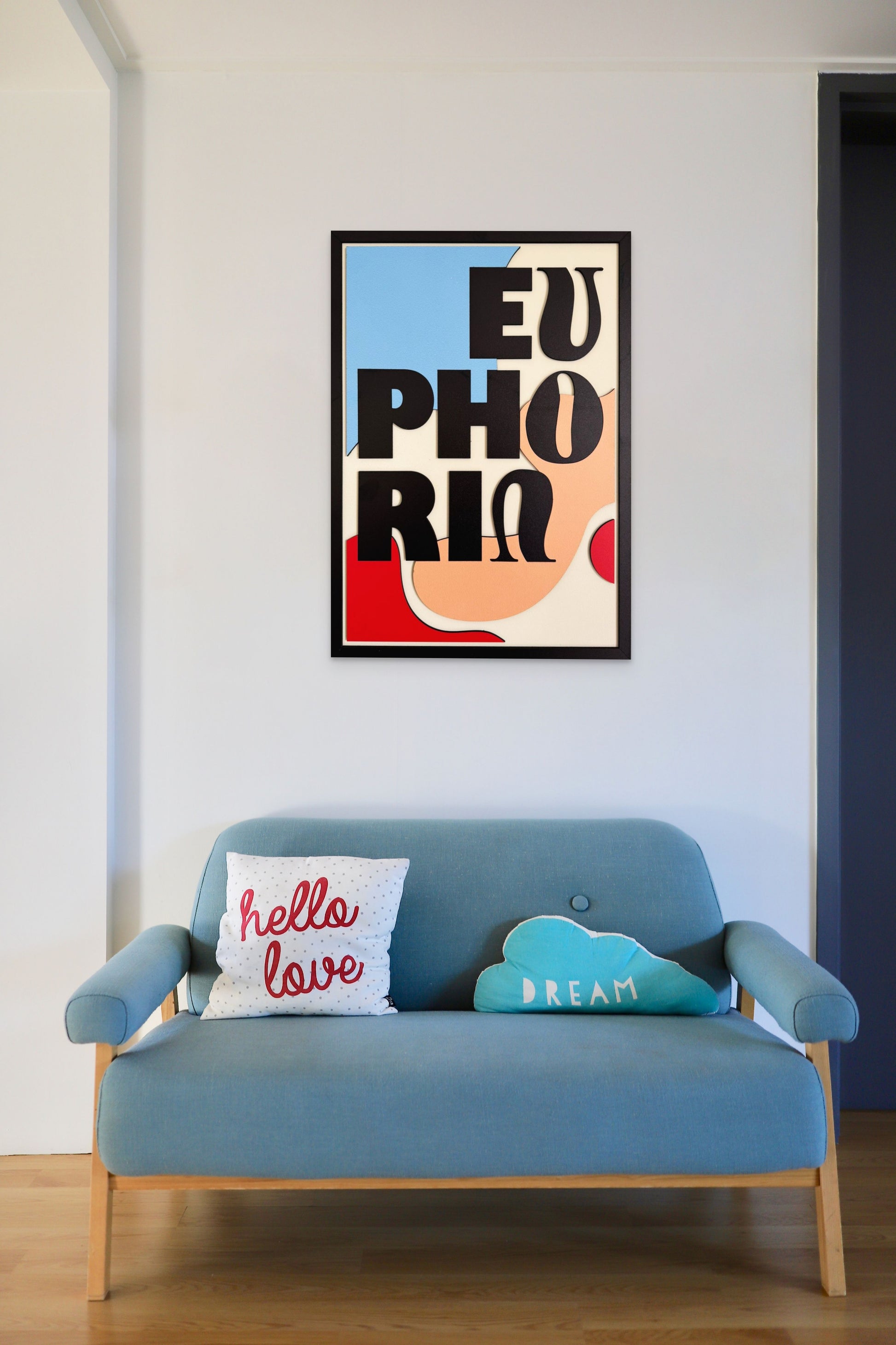 Euphoria wall art featuring the word 'Euphoria' in bold black letters with a color palette of blue, black, red, pink, and off-white. Perfect for modern and vibrant home decor.