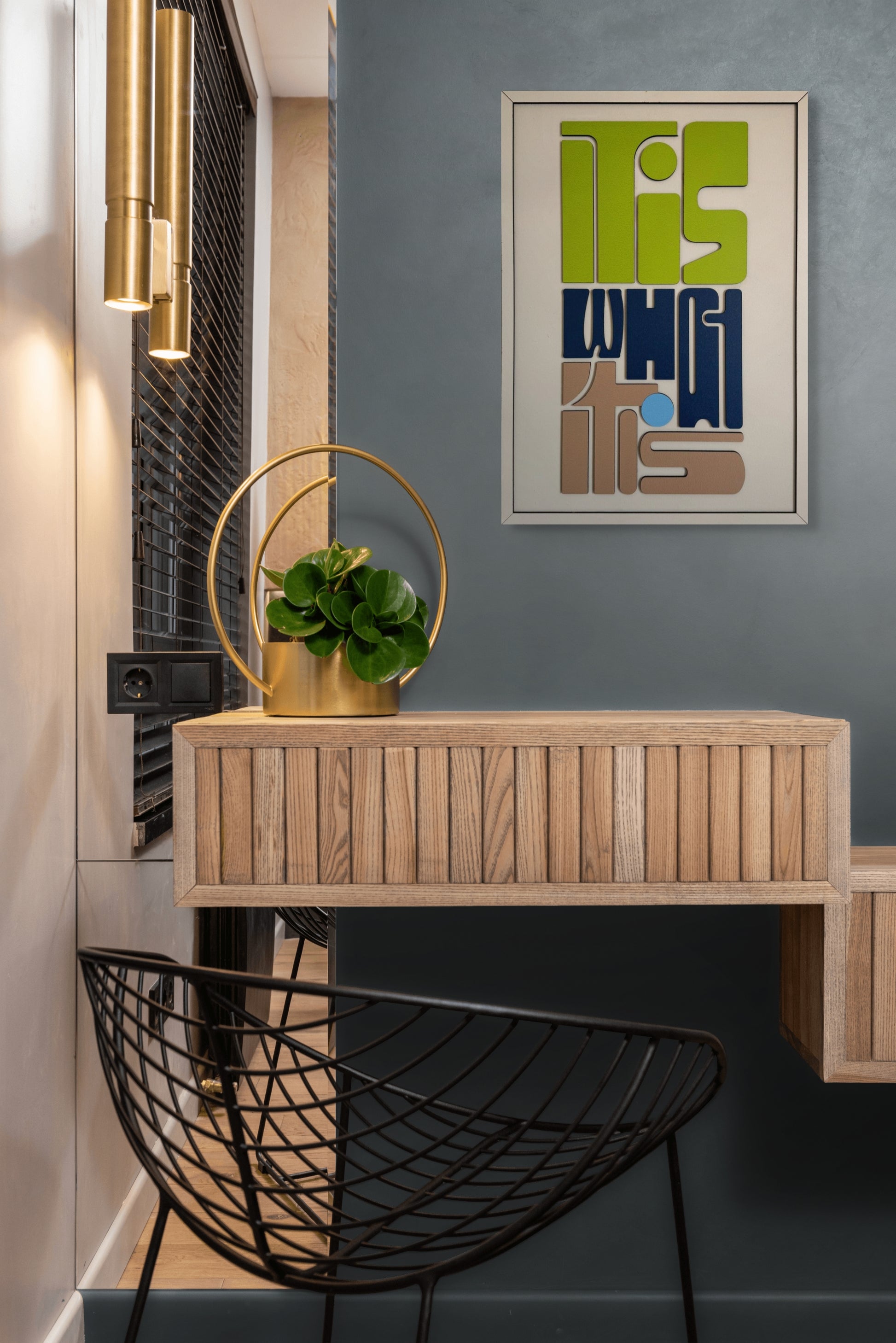 It Is What It Is wall art featuring the phrase in bold lettering, with a color palette of green, blue, sand, and off-white. Perfect for modern and inspirational home decor.